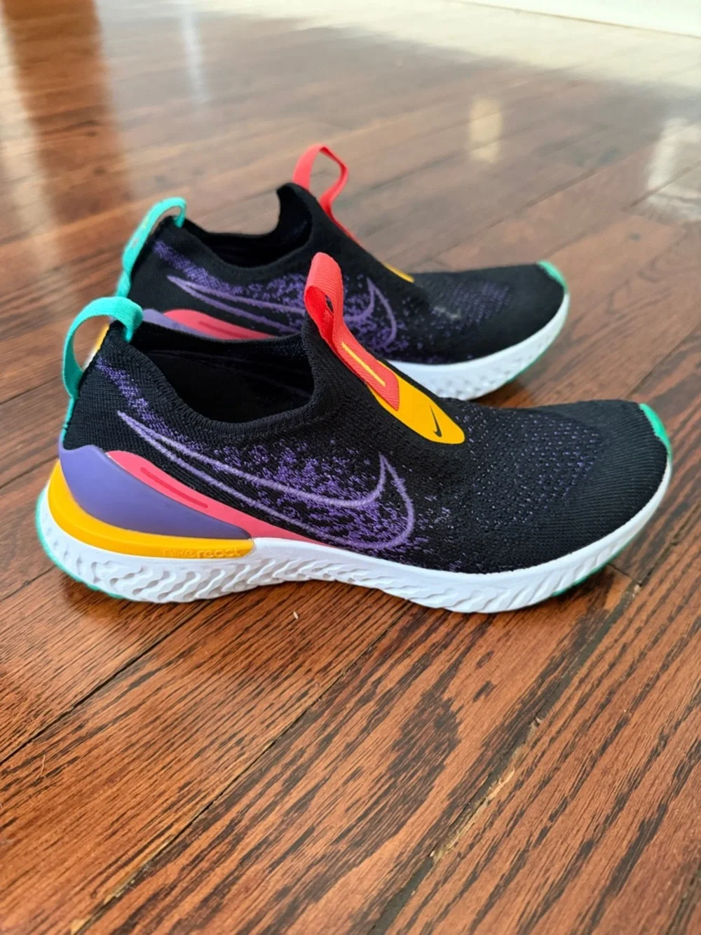 Nike Women's Black Athletic Slip-On Shoes with Purple, Teal & Yellow Accents